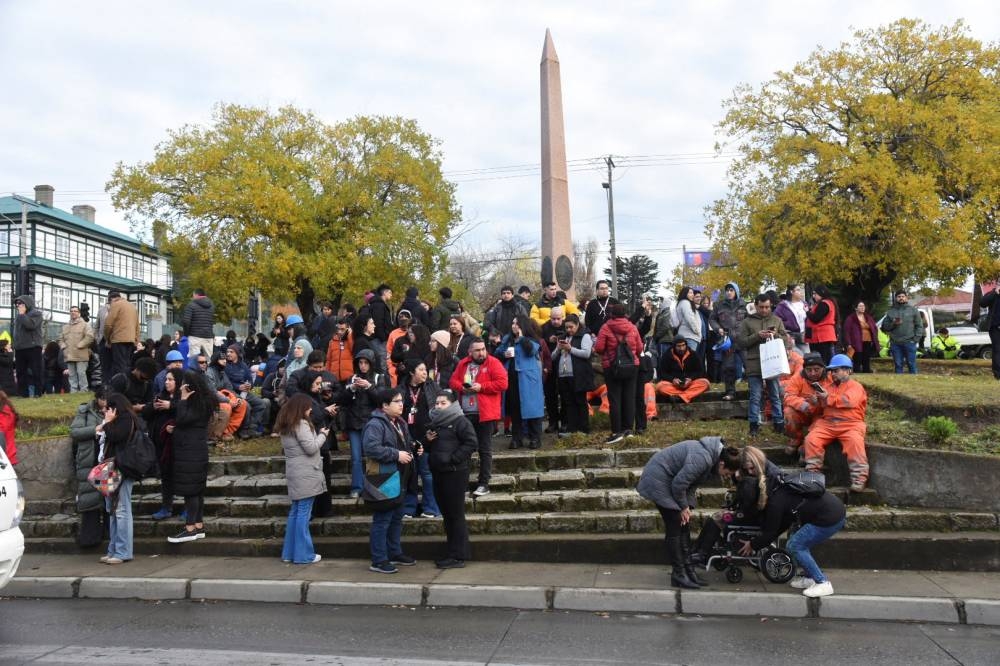 People evacuate the coastline in Chile, following a tsunami preventive advisory generated by local authorities, after an earthquake sparked a tsunami threat on the Pacific coast, in Punta Arenas, Chile, on Friday. REUTERS