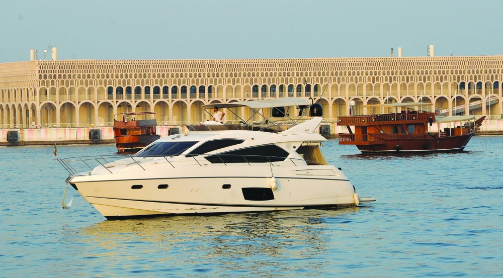 The three-day event displays an array of sea vessels, including yachts and traditional dhows.