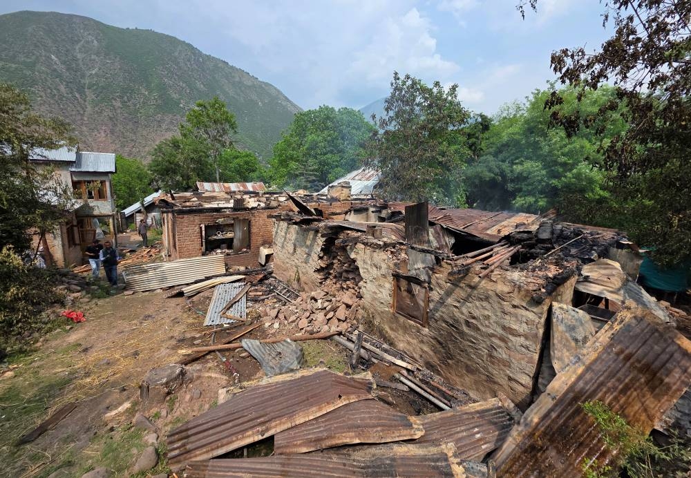 Residential houses are pictured after they were damaged by a cross-border shelling in Salamabad in India-administered Kashmir's Baramulla district, on Wednesday. REUTERS