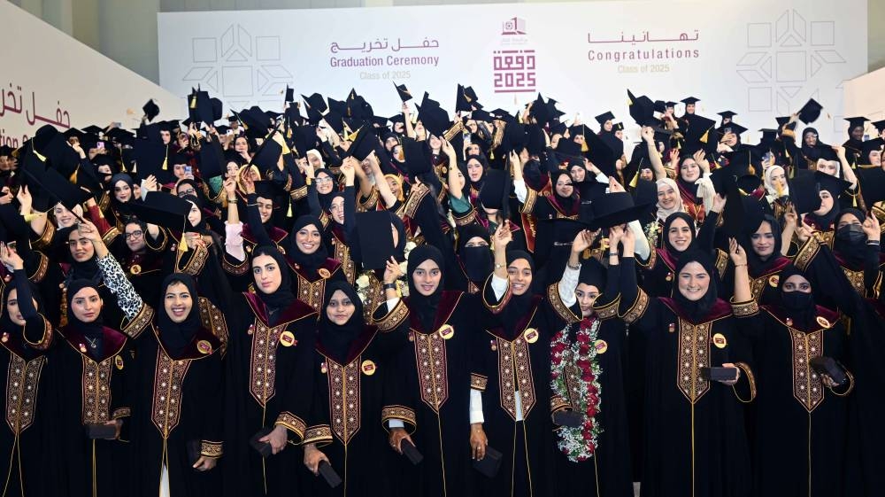 BACK PAGE PIC - The graduates celebrate after the ceremony yesterday.