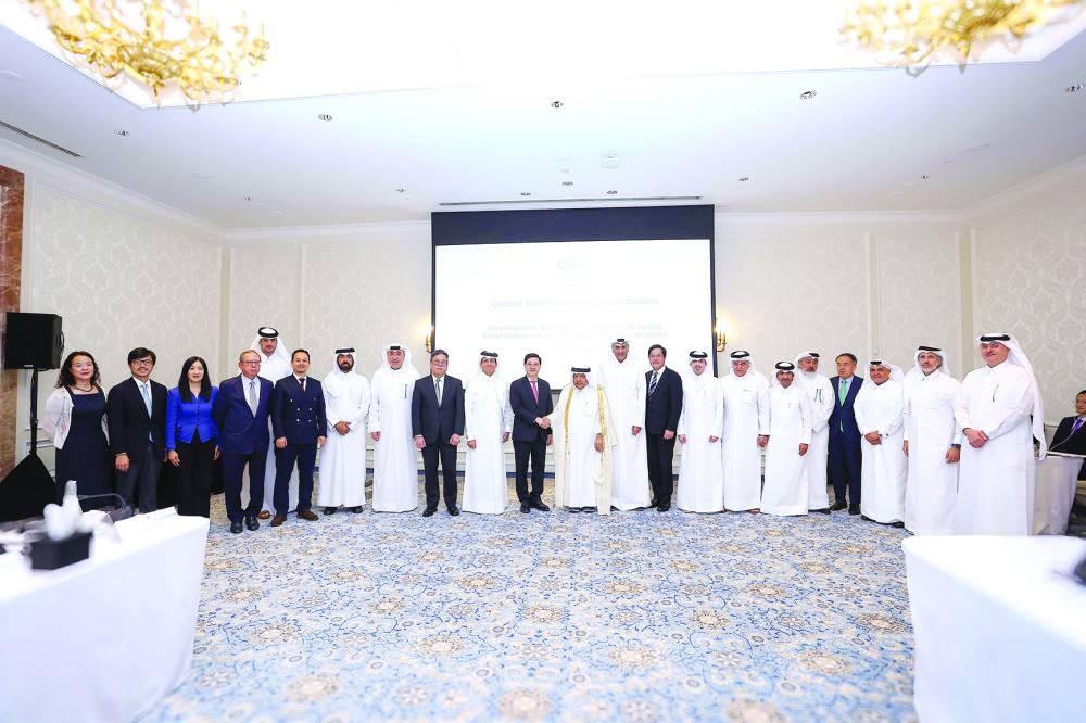 QBA chairman HE Sheikh Faisal bin Qassim al-Thani and shaking hands with John Lee, the chief executive of the Hong Kong Special Administrative Region (HKSAR), in the presence of QBA officials and members, as well as Lee's delegation.