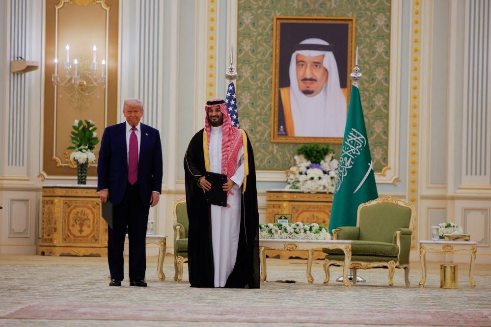 US President Donald Trump and Saudi Crown Prince and Prime Minister Mohammed Bin Salman attend a Memorandum of Understanding (MoU) signing ceremony at the Royal Court in Riyadh, Saudi Arabia, Tuesday. REUTERS