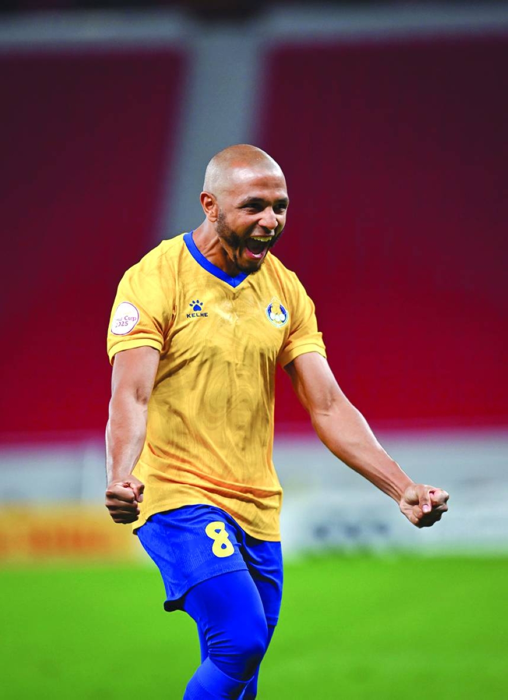 Yacine Brahimi of Al Gharafa celebrates scoring a goal against Al Sadd during their Amir Cup quarter-final at Al Thumama Stadium in Doha on Wednesday. Gharafa won 5-4 on penalties after both sides were locked at 2-2.