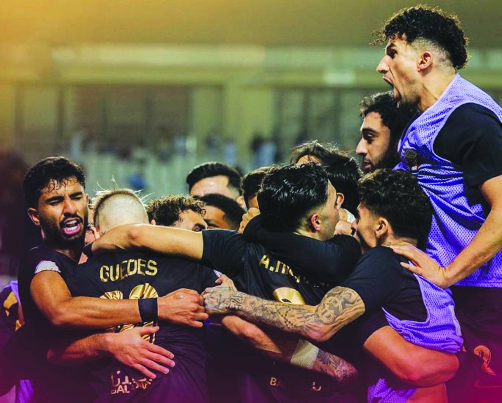 Al Rayyan players celebrate winning their Amir Cup quarter-final against Al Duhail at Jassim Bin Hamad Stadium in Doha on Wednesday.