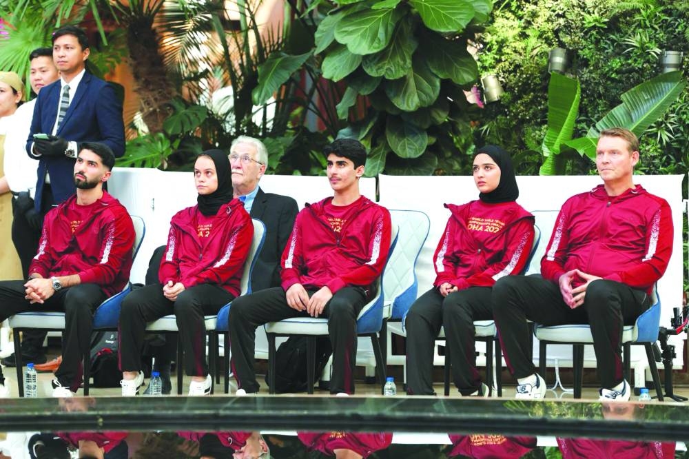 
Qatar players at a media event prior to the start of the championships. 