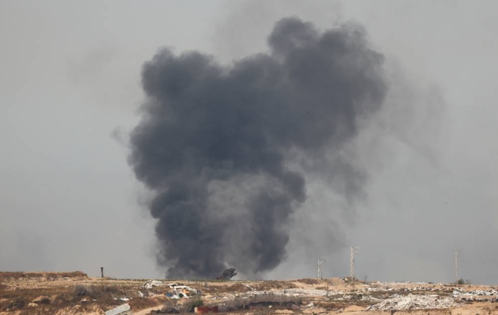 Smoke rises from northern Gaza, as seen from the Israeli side of the Israel-Gaza border, on Saturday. REUTERS