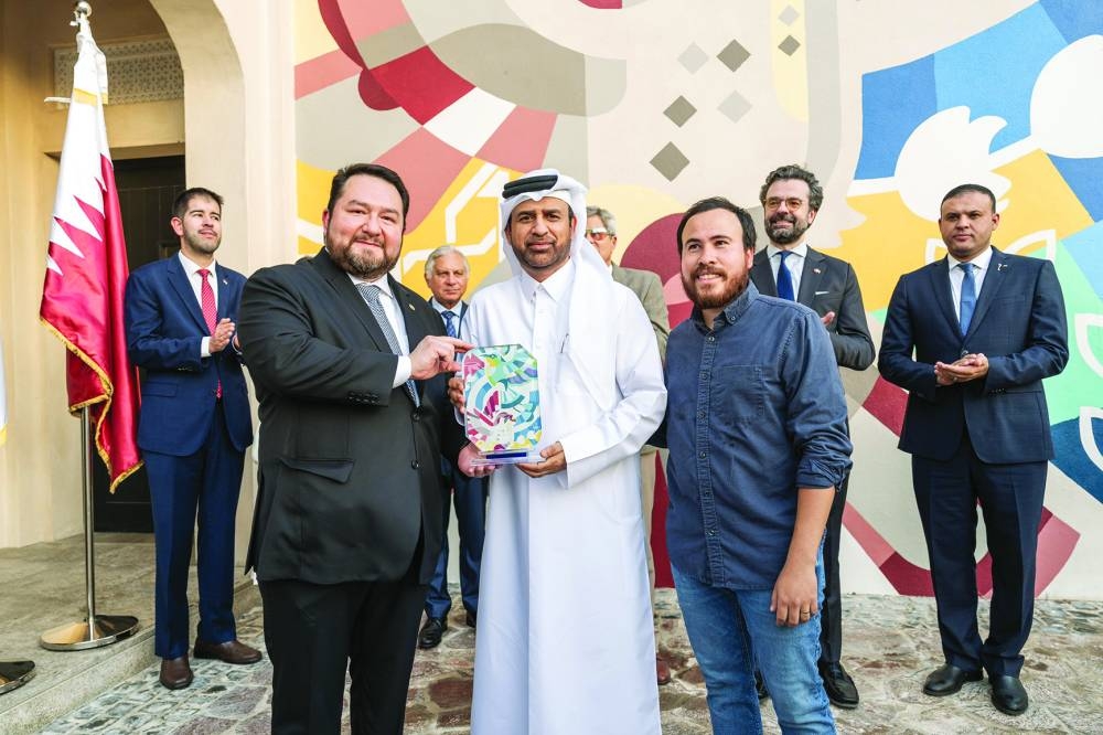 Katara Cultural Village general manager Prof Dr Khalid bin Ibrahim al-Sulaiti with El Salvador's ambassador Milton Eduardo Alcevedo and artist  Rodolfo Díaz during the unveiling ceremony.