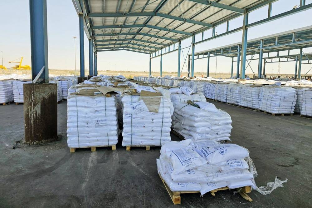 Stacks of aid are seen at the Kerem Shalom crossing between Israel and Gaza, on its Israeli side.
