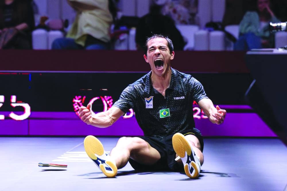 Brazil’s Hugo Calderano is overjoyed after his win over China’s Liang Jingkun in the semi-finals of the ITTF World Table Tennis Championships  Doha.