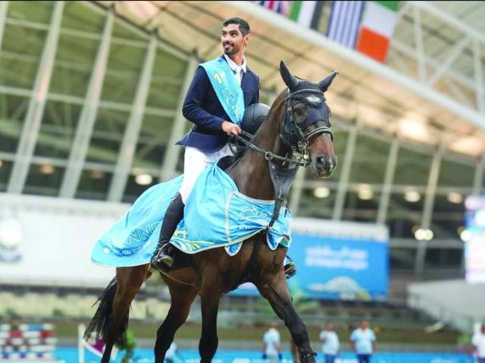 Hussain Saeed Haidan celebrates aboard D Saucedo after his victory.