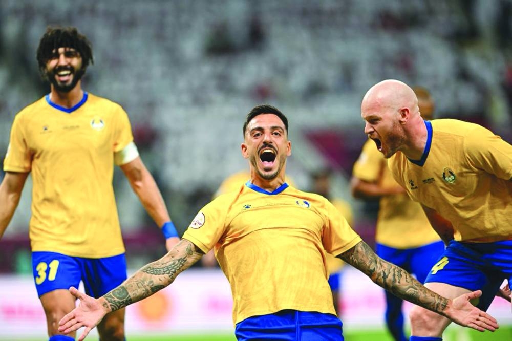 Joselu celebrates after scoring Al Gharafa second goal against Al Rayyan.