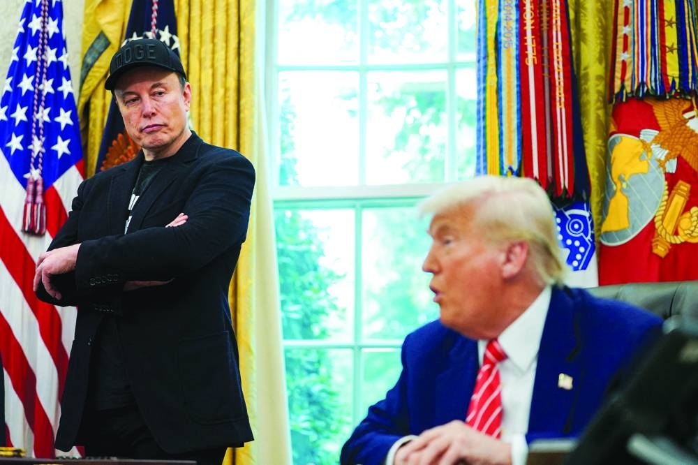 
US President Donald Trump and Elon Musk attend a press conference in the White House on May 30, 2025.  