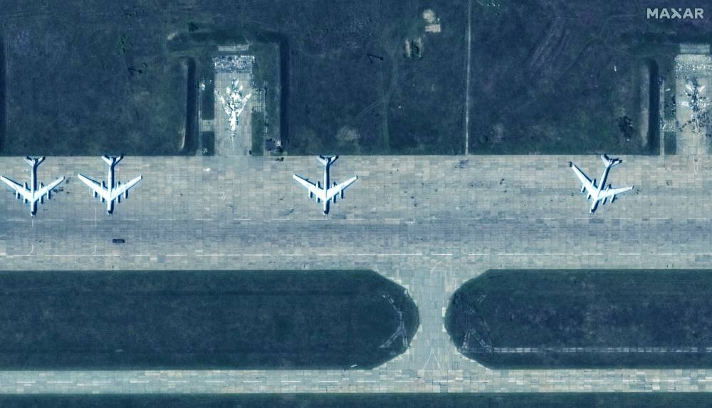 
A combination of satellite images shows a group of TU 95 aircrafts before (left) and after a drone strike, in Belaya air base, Irkutsk region, Russia, on May 22, 2025. (Reuters) 