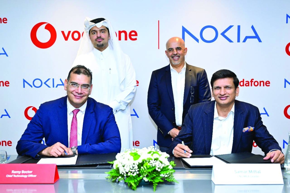 
Seated, from left: Ramy Boctor, chief technology officer at Vodafone Qatar, and Samar Mittal, vice-president and MEA head of Cloud & Network Services at Nokia, during a recent signing ceremony. Looking on are (from left) Sheikh Hamad Abdulla Jassim al-Thani, CEO at Vodafone Qatar, and Raghav Sahgal, president of Cloud and 
Network Services at Nokia. 