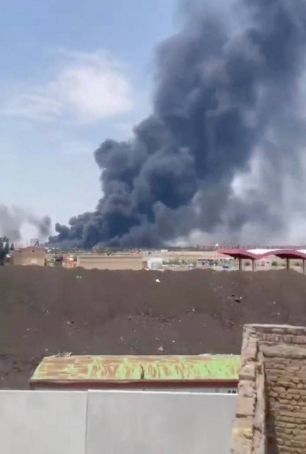 Smoke rises from Tabriz airport in Iran, on Friday, in this screengrab obtained from a social media video. Social Media/via REUTERS