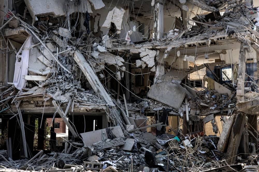 A destroyed building is pictured at a site in Tel Aviv hit by a missile fired from Iran on on Saturday. AFP
