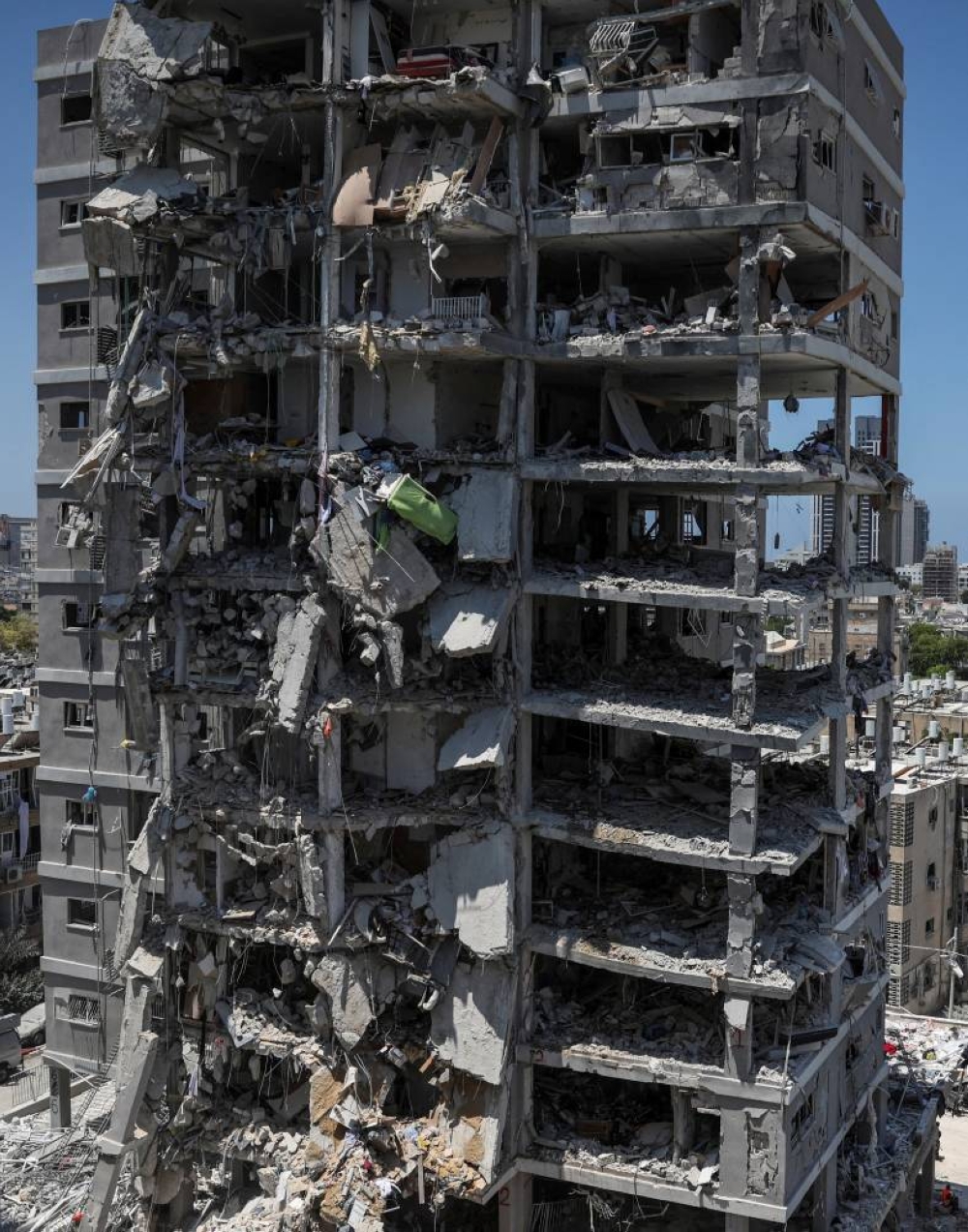 A building stands damaged following a missile attack from Iran, in Bat Yam, Israel, on Sunday. REUTERS