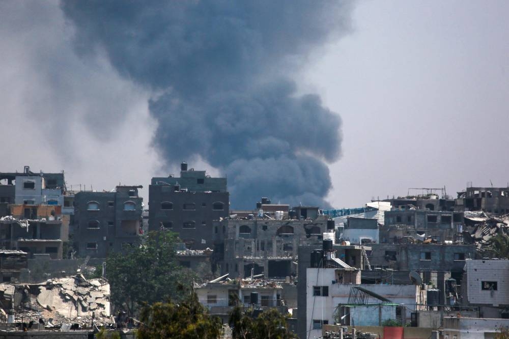 A column of smoke rises amid Israeli bombardment in the east of Jabalia in the northern Gaza Strip on on Monday. AFP