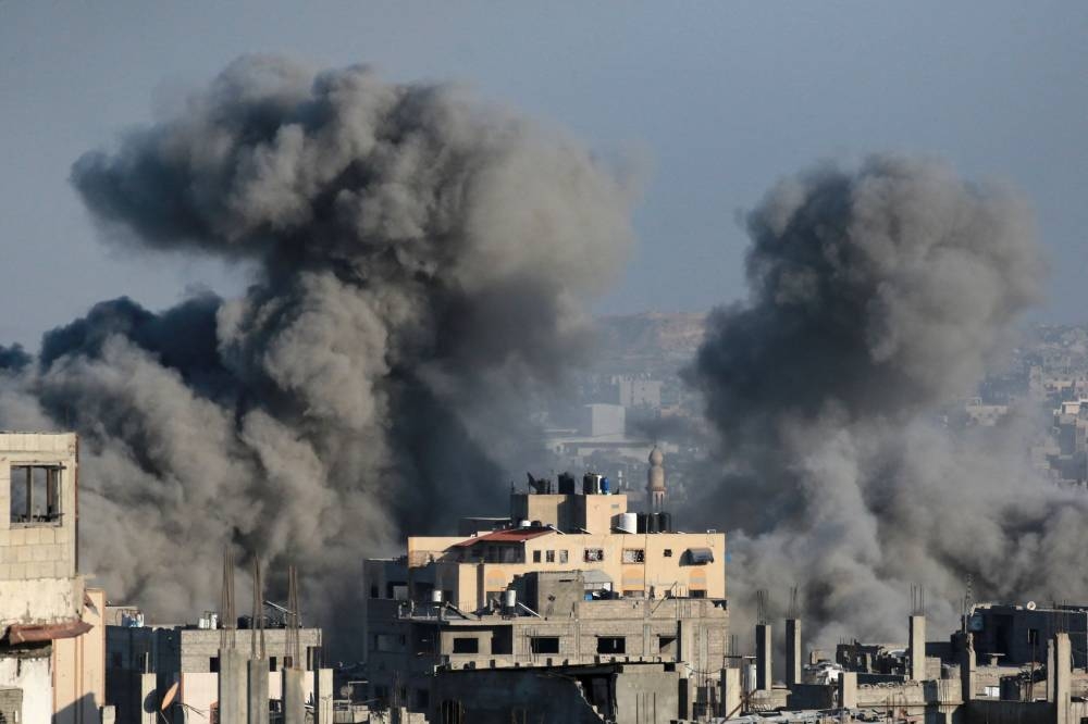 Smoke billows after an Israeli strike on Jabalia in the northern Gaza Strip on Saturday. AFP