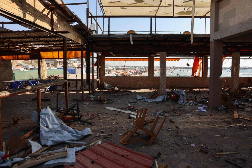Debris is scattered across the floor at Al-Baqa cafeteria which was devastated in an Israeli strike on the Gaza City seafront, on Monday. AFP
