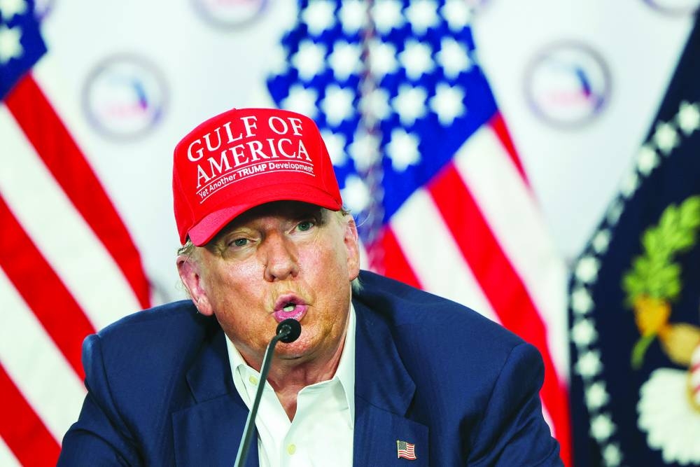 Trump speaks as he visits a migrant detention center in Florida, Tuesday.