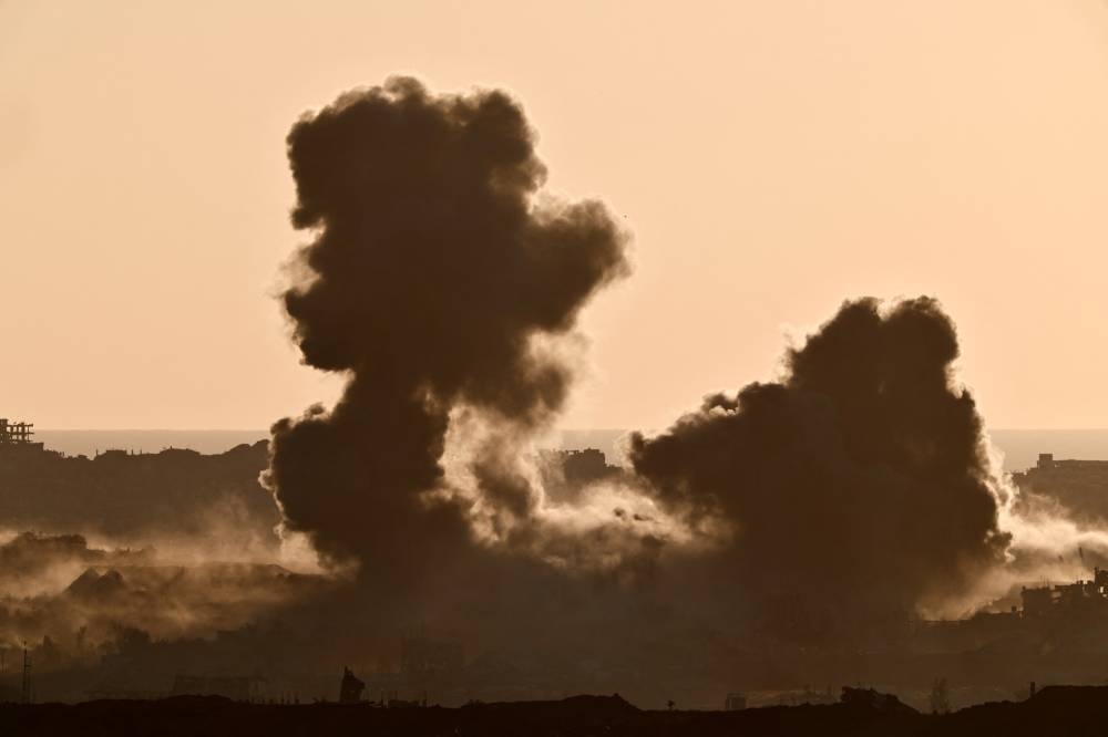 Smoke rises in Gaza following an explosion, as seen from the Israeli side of the border, on Saturday.