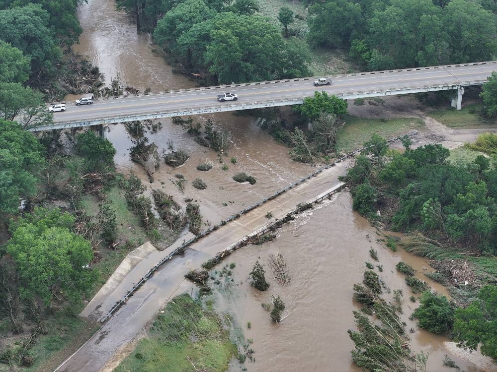 A drone view shows fallen trees, as a result of flash flooding, in Comfort, Texas, on Saturday.