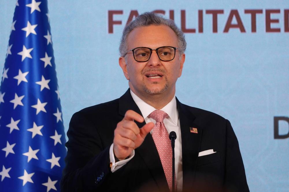 US special envoy for Africa Massad Boulos addresses the media in Doha after the Democratic Republic of Congo and Rwanda-backed armed group M23 signed a ceasefire deal in the Qatari capital on July 19, 2025 to end fighting that has devastated the country's mineral-rich but conflict-torn east. The truce was agreed in a Declaration of Principles signed by the two sides after three months of talks in Qatar, which follows a separate Congolese-Rwandan peace deal signed in Washington last month. (Photo by Karim JAAFAR / AFP)