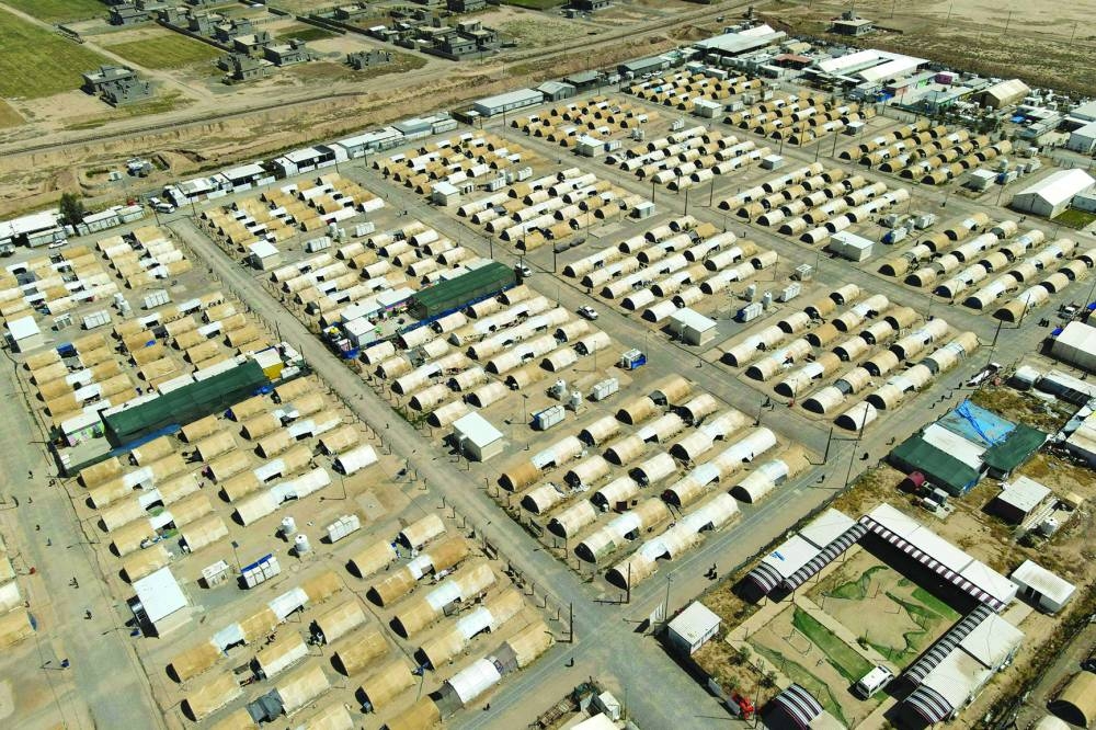 File photo of an aerial view of tents lined up in the Al-Amal Camp (formerly Al-Jadaa), south of Mosul in northern Iraq, which houses Iraqi families who have been repatriated from Syria's Al-Hol camp.