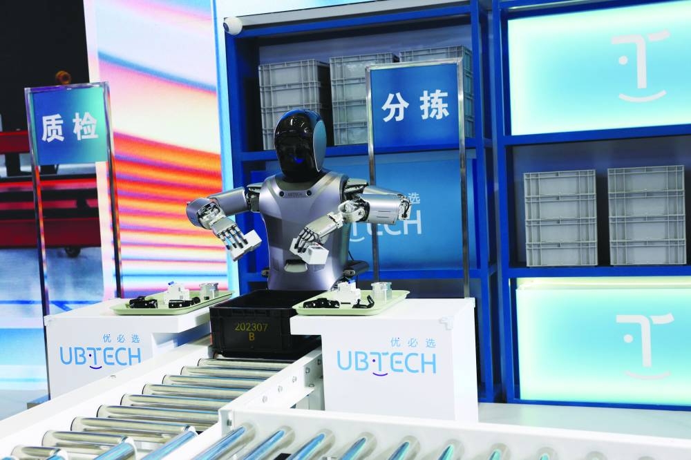 
FILE PHOTO: A UBTECH humanoid robot demonstrates its applications on a factory assembly line, at the World Robot Conference in Beijing on Aug 21, 2024. 