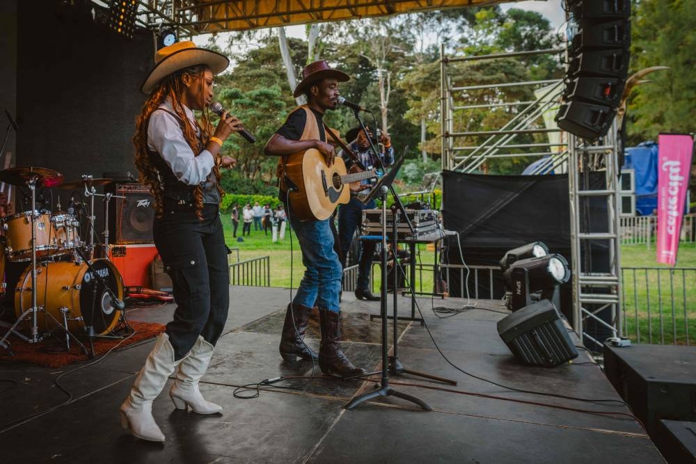 Ythera the Cowgirl (left) performs during the International Cowboy Day at Ngong race course in Nairobi.