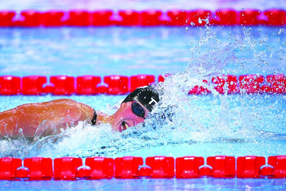 US' swimmer Katie Ledecky competes in the final of the women's 1500m freestyle swimming event during the 2025 World Aquatics Championships in Singapore on July 29, 2025. (Photo by François-Xavier MARIT / AFP)