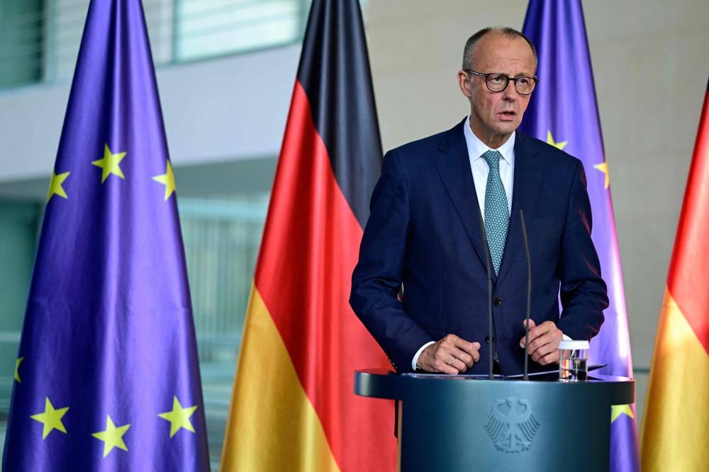 German Chancellor Friedrich Merz makes a statement to journalists following a meeting of the security Cabinet of the German government at the Chancellery in Berlin on July 28, 2025. AFP