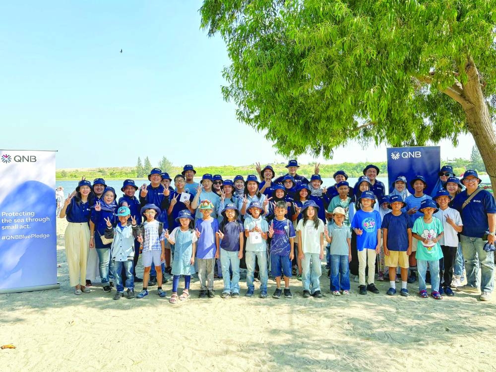 D/C pic - On Ancol Beach overlooking the Java Sea, QNB Indonesia joined the #QNBBluePledge initiative.