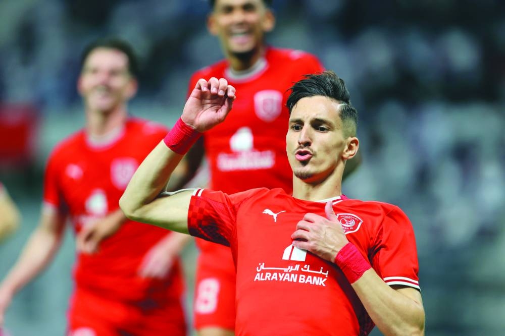 
Al Duhail fans celebrate their team’s victory at the Khalifa International Stadium yesterday.
 