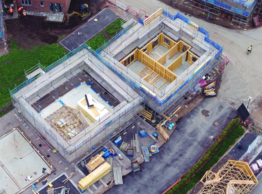 
A drone view shows timber framing supplied by Donaldson Timber Systems being installed on a new Bellway housing development in Horwich, Britain. 