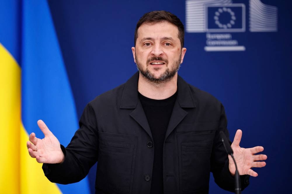 Ukraine's President Volodymyr Zelensky speaks during a joint press conference with European Commission President in Brussels, on August 17, 2025. (AFP)