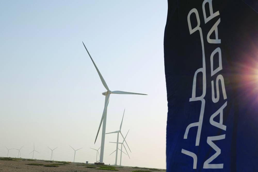Windmill turbines stand in Masdar's wind farm on Sir Bani Yas Island, in Abu Dhabi.