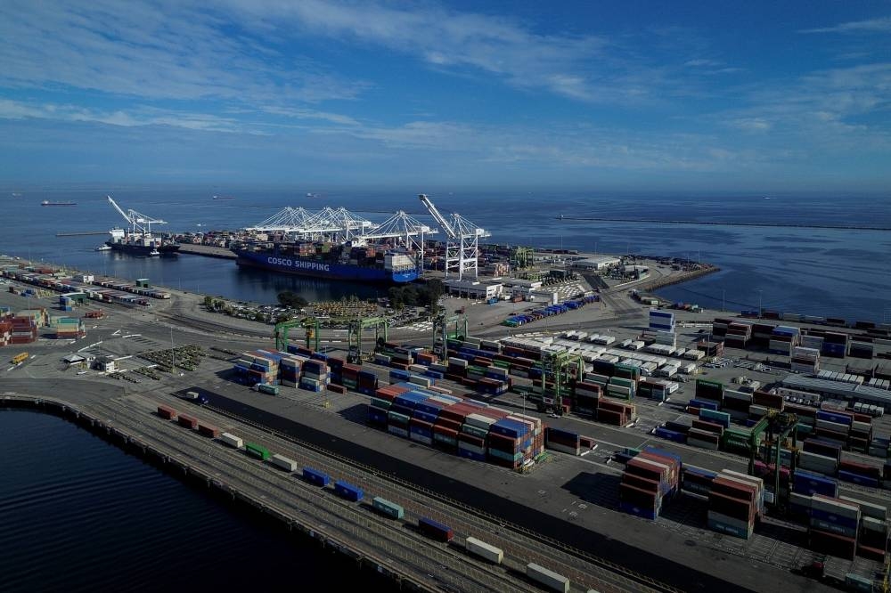 Container ships at the Port of Long Beach in Long Beach, California, on Thursday. A US trade provision dating to the 1930s, which eventually cleared the way for more than a billion small parcels each year, ended on Friday.