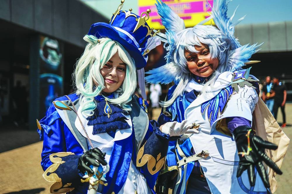 Cosplayers pose for a portrait during the Comic Con Africa at Nasrec Expo Centre in Johannesburg, Saturday.