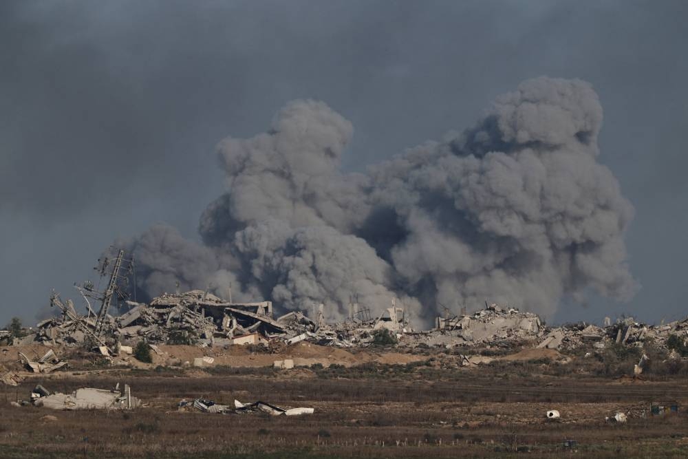 Smoke rises from Gaza after an explosion on Monday. REUTERS