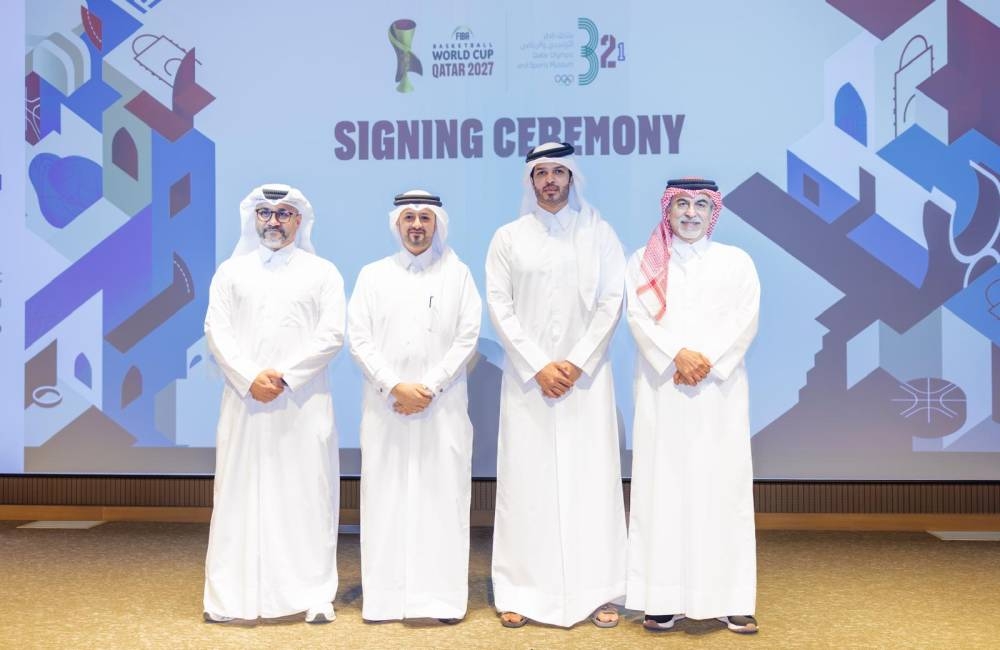 Mohammed Saad al-Rumaihi, Chief Executive Officer of Qatar Museums, and Mohammed Saad al-Mughaseeb, Director General of the Organizing Committee of the FIBA Basketball World Cup Qatar 2027 and President of the Qatar Basketball Federation, Abdullah Yousuf al-Mulla, Director of the 3-2-1 Qatar Olympic and Sports Museum and Fahad Ibrahim Gumaa, Executive Director of Strategic Planning and Integration at LOC, after a signing ceremony in Doha Monday.