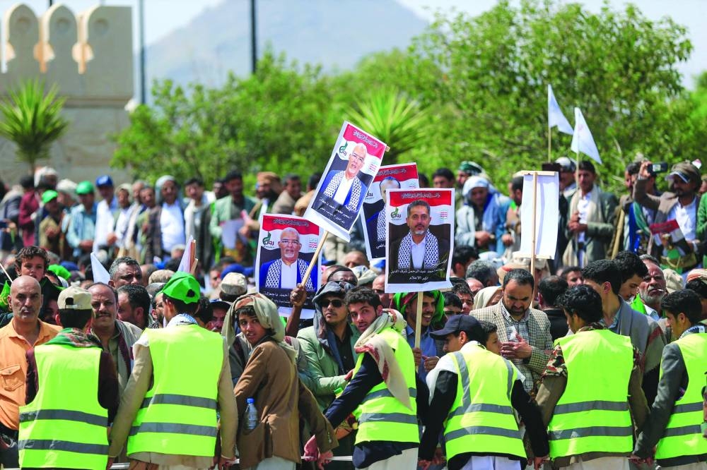 Mourners attend the funeral procession for slain Prime Minister of Yemen's Houthi-led government Ahmed Ghaleb al-Rahwi and other officials, killed in an Israeli strike days earlier, in Sanaa, Monday.