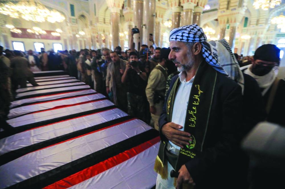 Interim Prime Minister of yemen's Huthi-led government Mohammed Miftah attends the funeral of his slain predecessor Ahmed Ghaleb Al-Rahwi and other officials, killed in an Israeli strike days earlier, in Sanaa on September 1, 2025. Yemen's Huthi rebels held a funeral on September 1 for their prime minister, nine ministers, and two cabinet officials, killed in an Israeli air strike on August 28 as they attended a government meeting in the Sanaa area. (AFP)