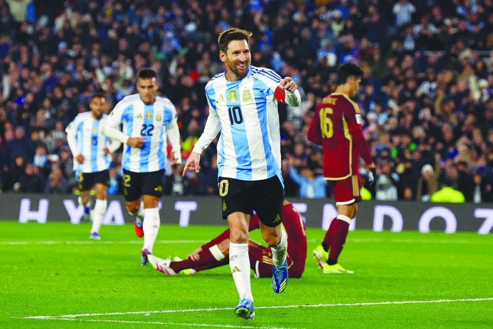 Soccer Football - World Cup - CONMEBOL Qualifiers - Argentina v Venezuela - Estadio Monumental, Buenos Aires, Argentina - September 4, 2025 Argentina's Lionel Messi celebrates scoring their third goal REUTERS