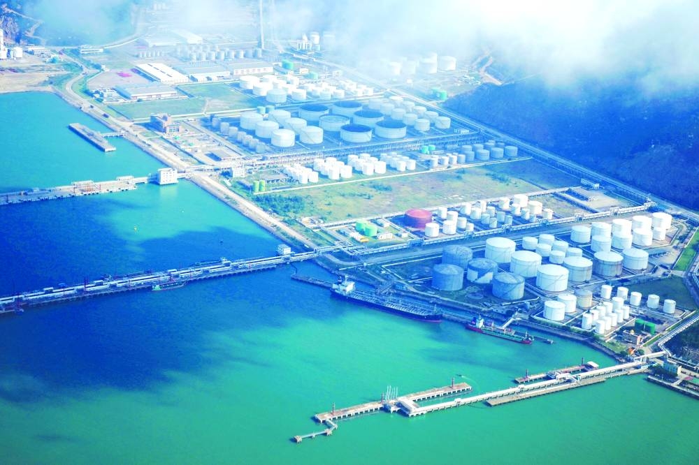 Oil and gas tanks are seen at an oil warehouse at a port in Zhuhai, China. Earlier this year, China piled into the crude market to snap up millions of barrels, including some that went into its strategic storage. The buildup has since slowed down as the nation’s domestic demand picked up, but with expectations that Beijing will continue to amass barrels, its next steps are seen as critical.