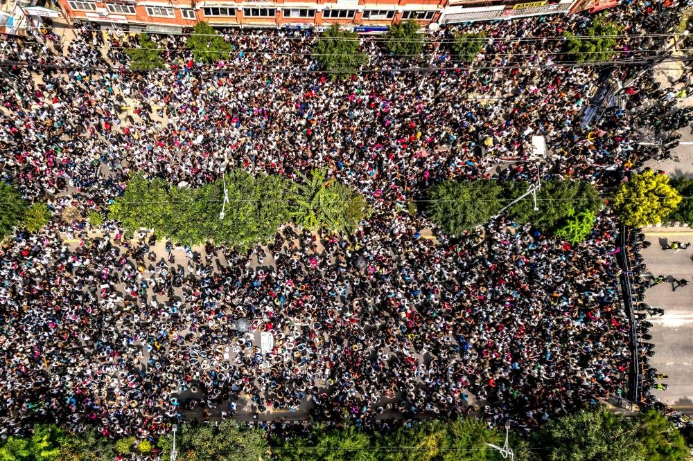 An aerial view shows demonstrators gathered outside Nepal's Parliament during a protest in Kathmandu on September Monday, condemning social media prohibitions and corruption by the government. AFP