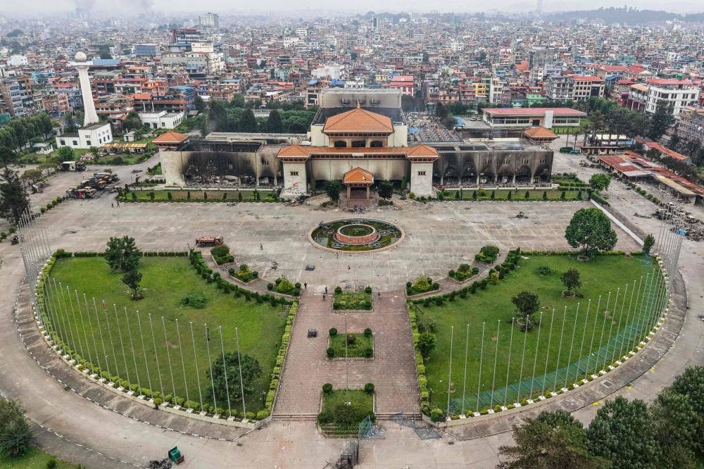 An aerial view shows the torched Parliament building in Kathmandu on on Wednesday. AFP