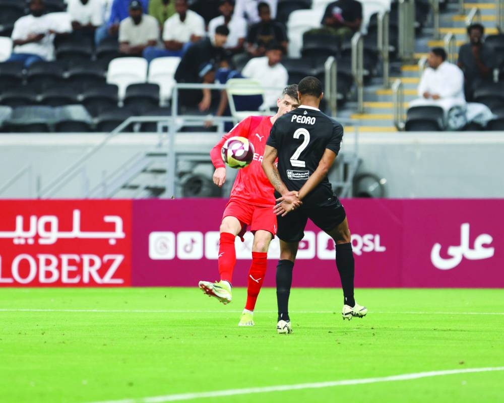 Al Shahania's Pelle van Amersfoort scores against Al Sadd at the Al Bayt Stadium.