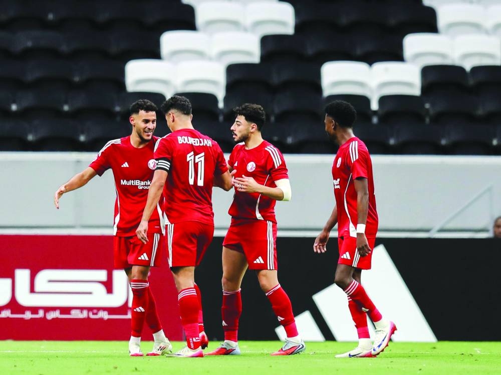 Al Shamal players celebrate after scoring against Al Arabi in the Qatar Stars League at the Al Bayt Stadium Saturday.